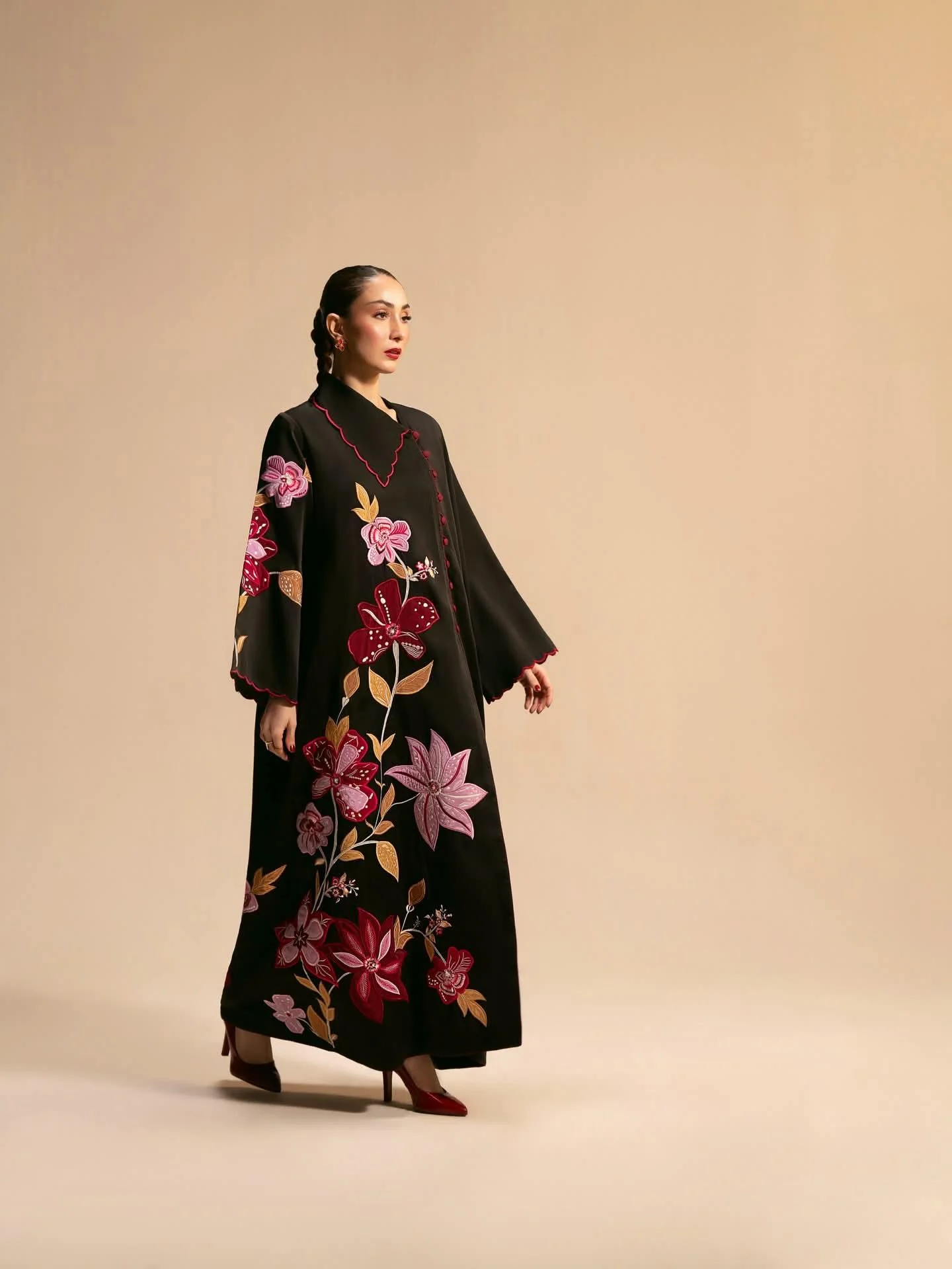 Black floral embroidered abaya for women with red and pink flower design, luxury modest wear dress by Shanzayb